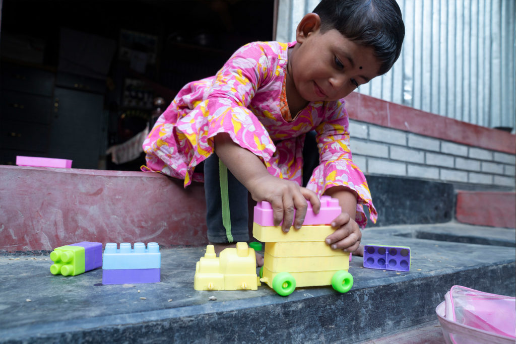 Sumaya, a girl with hearing and speaking disability receiving help from Friendship