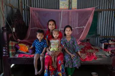 Shoneka Begum and her children on Friendship plinth